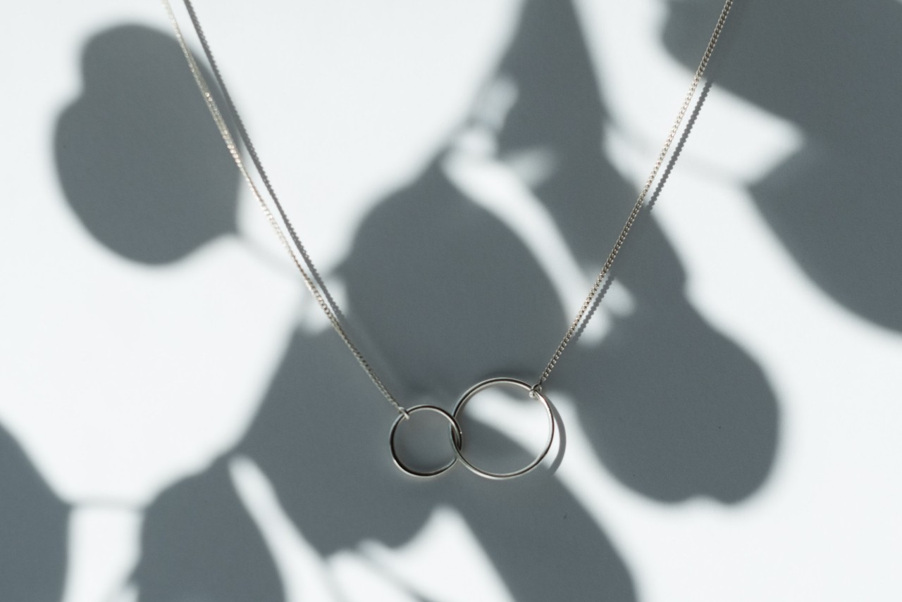 Silver necklace with a fine chain and interlocking circle pendants