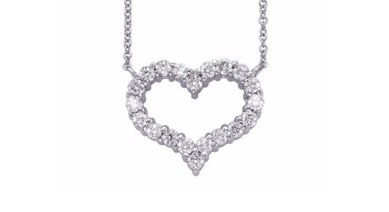 A white gold heart pendant necklace dotted with diamonds by S Kashi & Sons