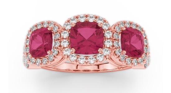 A rose gold fashion ring featuring three large rubies surrounded by diamond accent stones