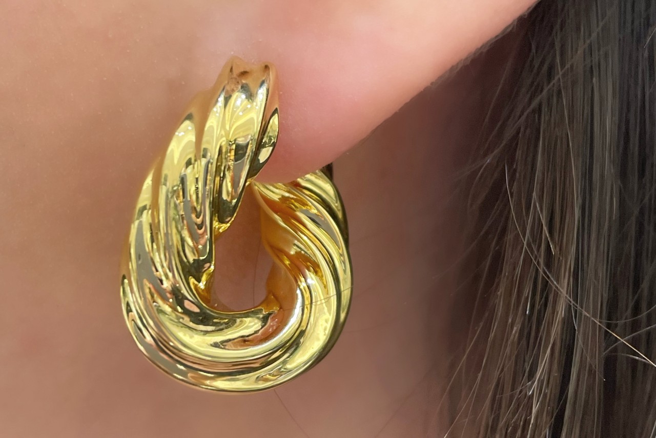 gold sculptural hoop earring