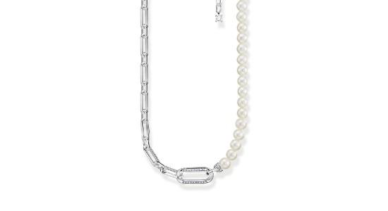 a pearl and chain necklace with a diamond studded link at its centre