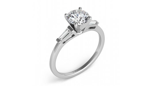 a white gold, three stone engagement ring by S Kashi & Sons