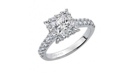 a white gold engagement ring with a princess cut center stone and halo setting