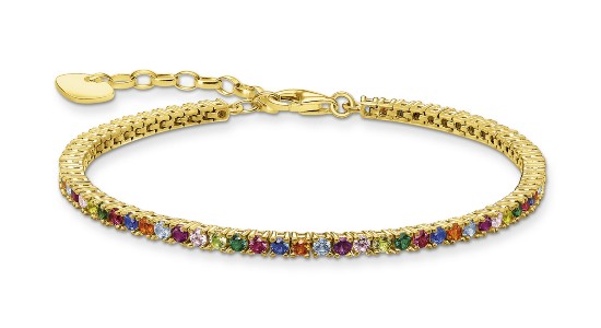 a yellow gold line bracelet featuring multicolored gemstones