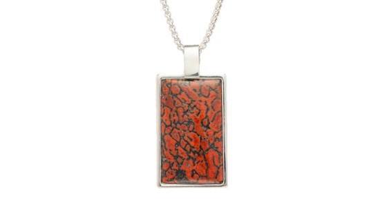 a white gold pendant necklace with a rectangular pendant featuring swirls of color