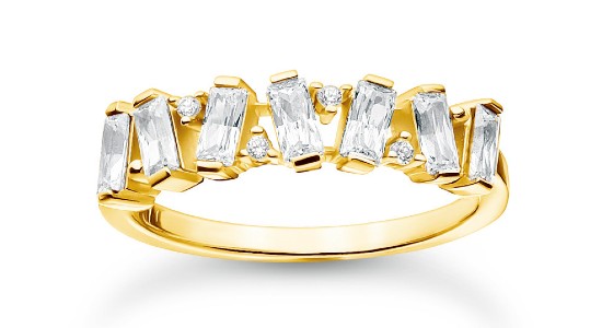 a yellow gold fashion ring with baguette and round cut diamonds