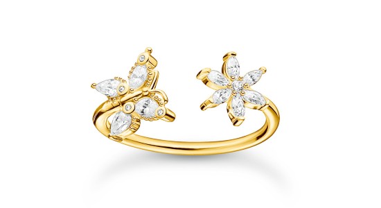 a yellow gold fashion ring featuring a butterfly and flower motif