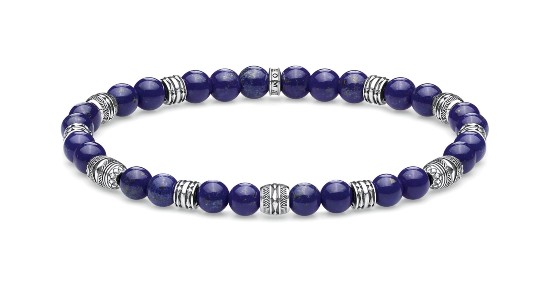 a beaded bracelet with silver accents and lapis lazuli