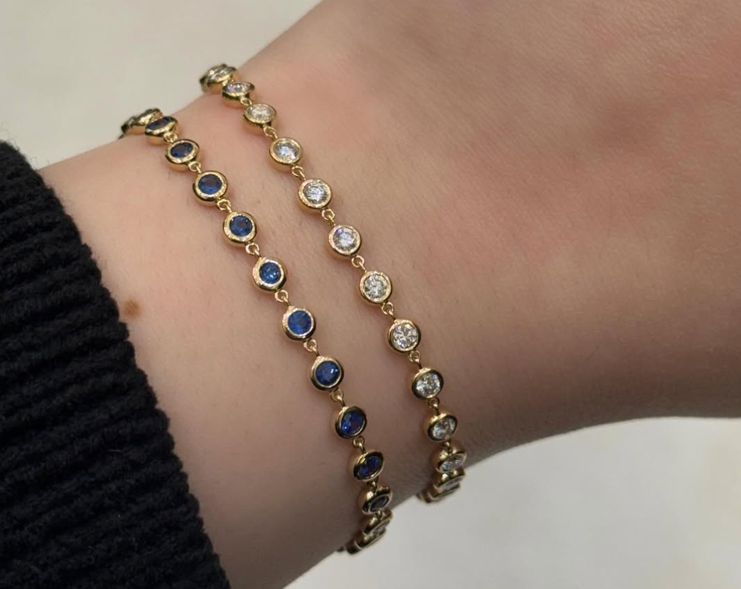 bezel set sapphire and diamond gold bracelets at Damiani Jewellers